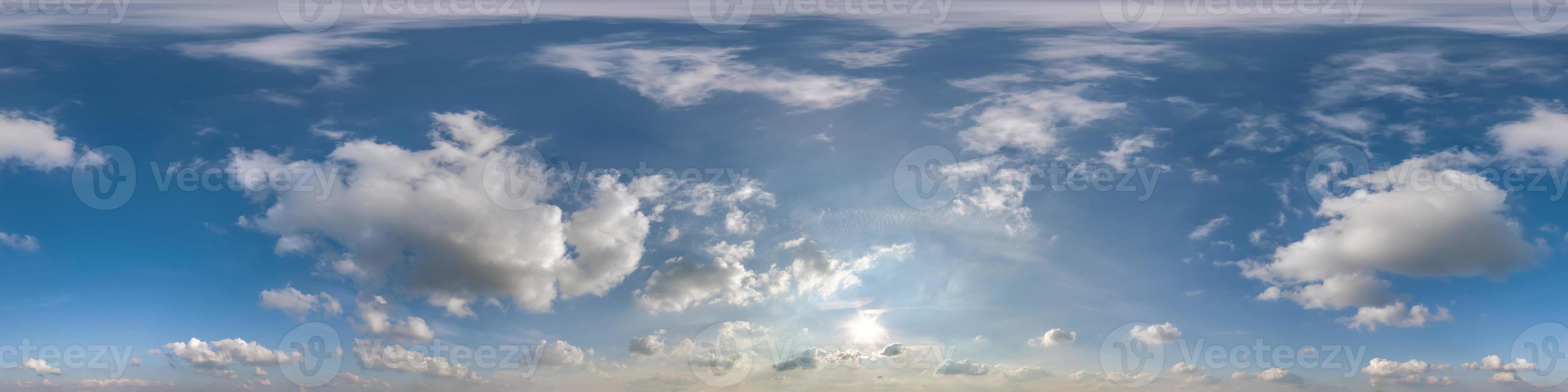 blue sky with beautiful clouds as seamless hdri 360 panorama view with zenith in spherical equirectangular format for use in 3d graphics or game development as sky dome or edit drone shot photo