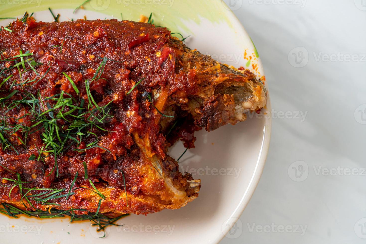 Deep fried fish and chili sauce photo