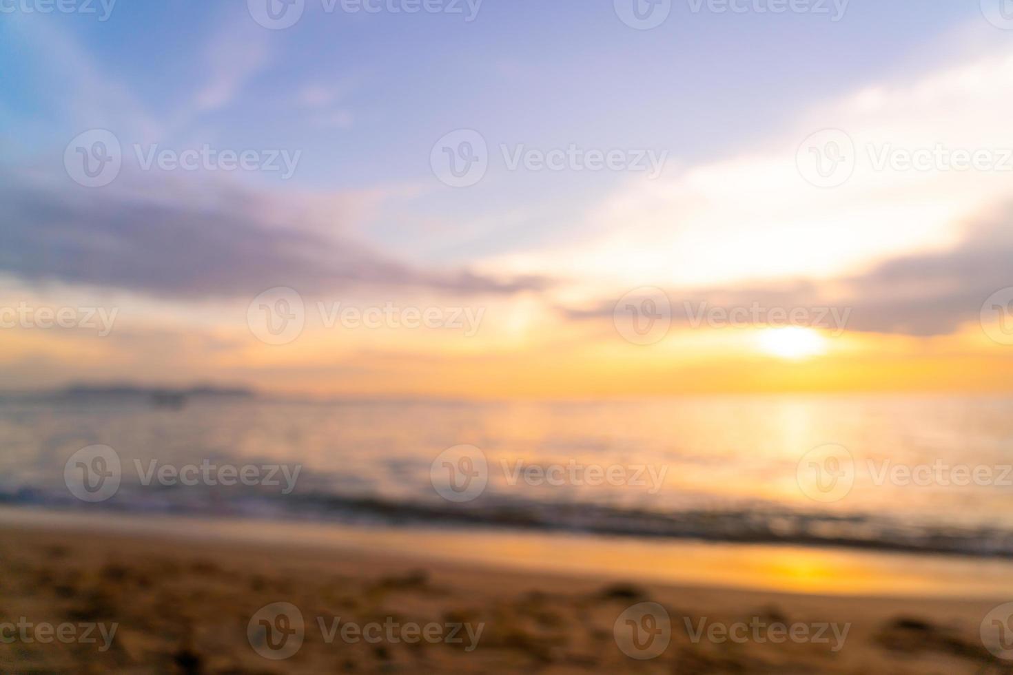 abstract blur beautiful tropical beach and sea with twilight sky at sunset times photo