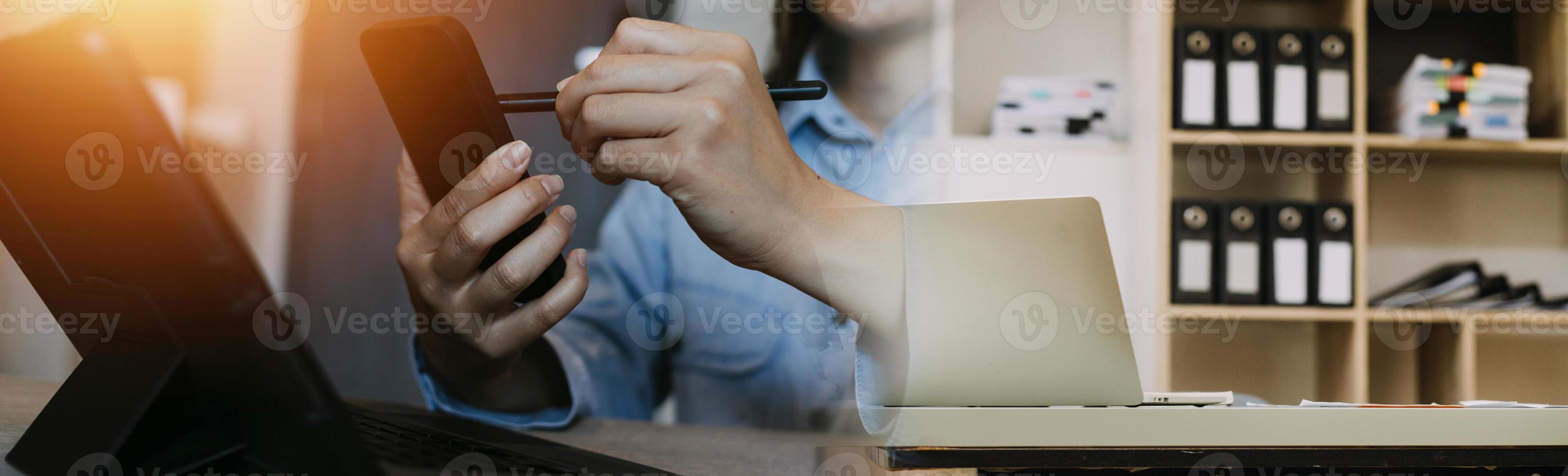 Business team present. professional investor working new start up project. Finance managers meeting.Digital tablet docking screen computer design smart phone using, in morning light photo