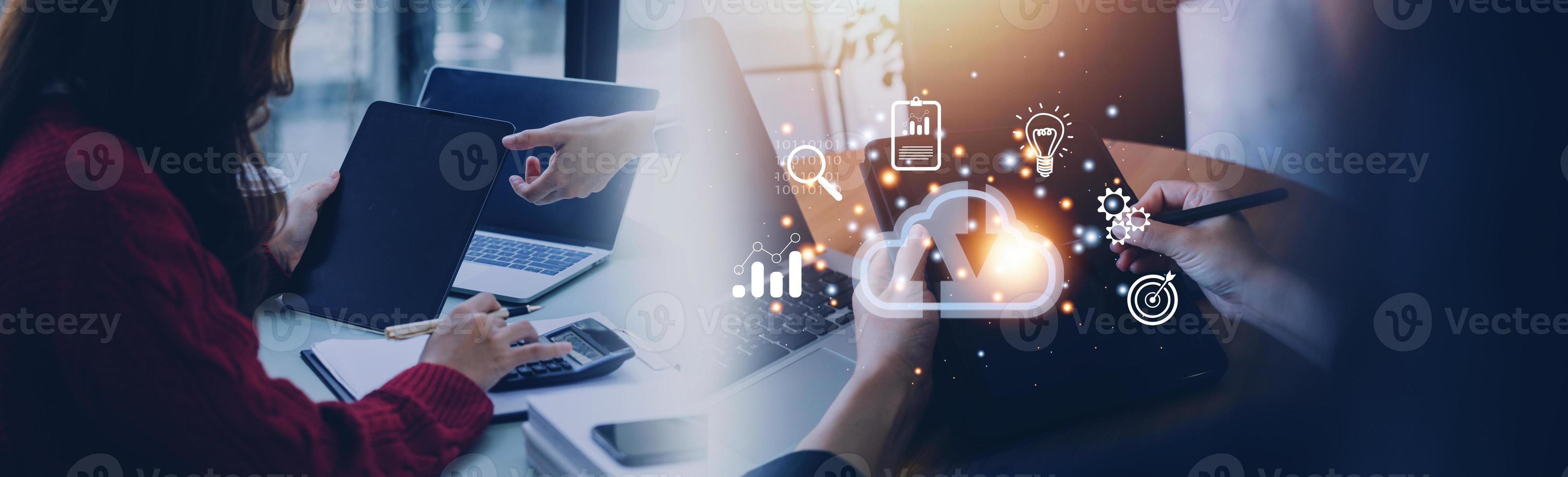 man use Laptop with cloud computing diagram show on hand. Cloud technology. Data storage. Networking and internet service concept. photo