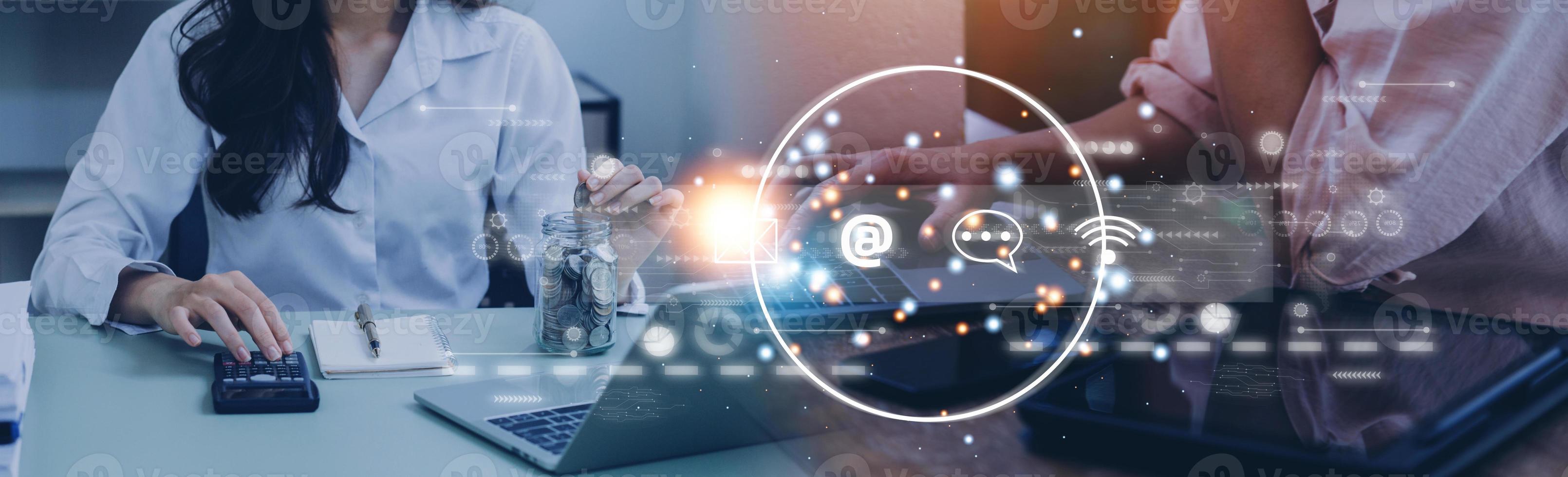 Contact us or Customer support hotline people connect. Businessman using a laptop and touching on virtual screen contact icons email, address, live chat, internet wifi. photo