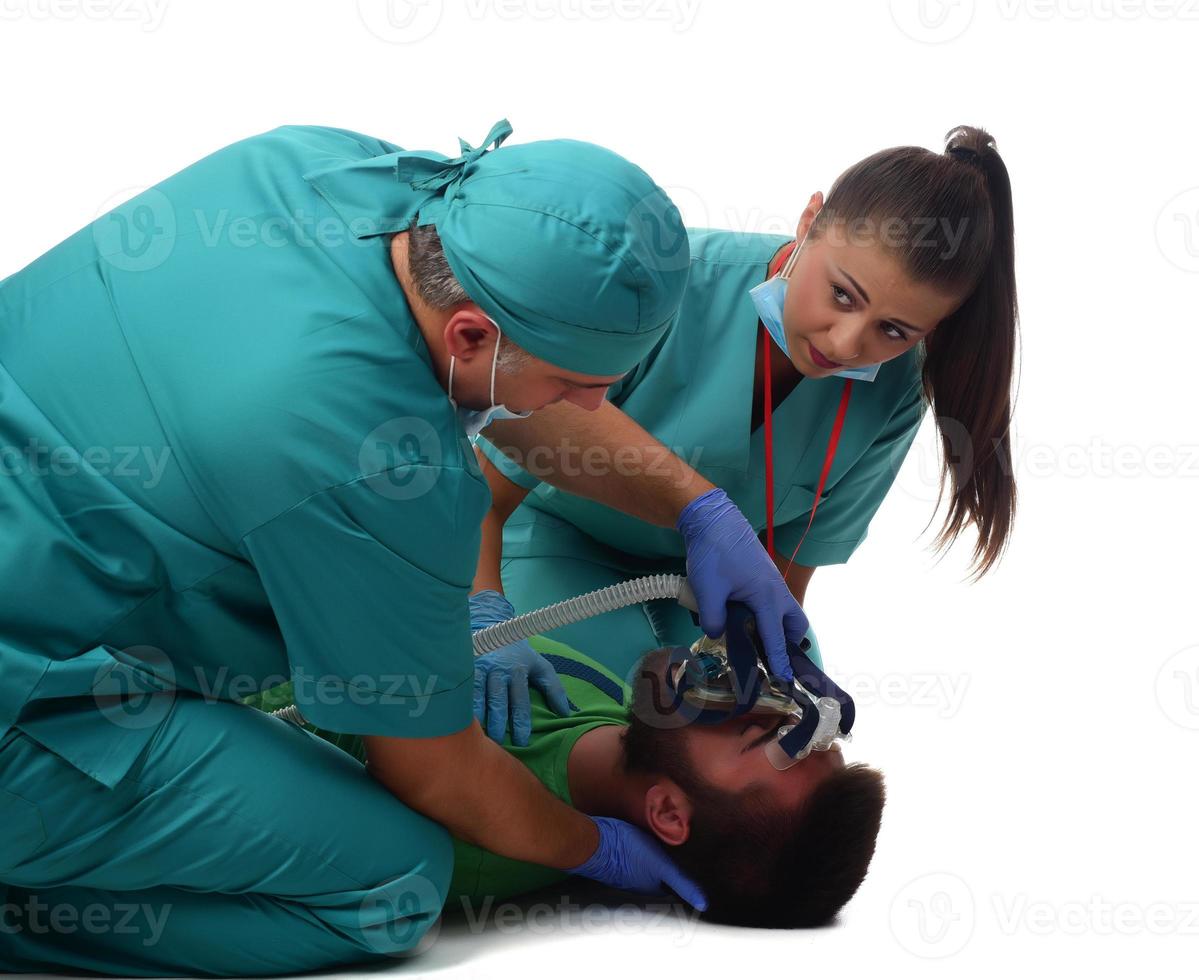 medical team giving CPR to patient. isolated photo