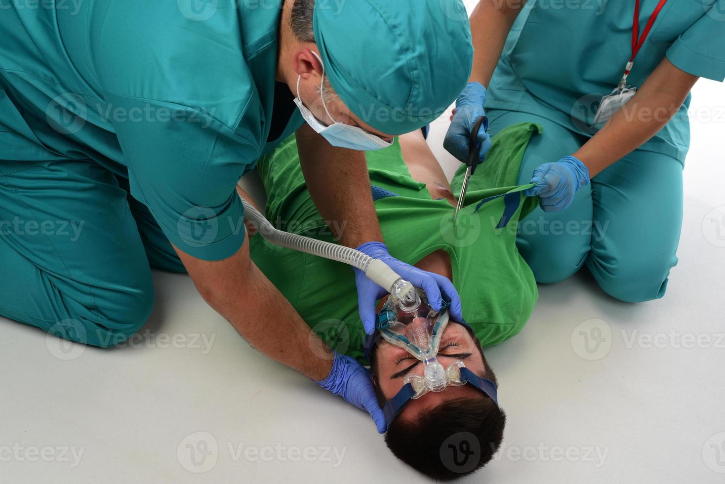 medical team giving CPR to patient. isolated photo