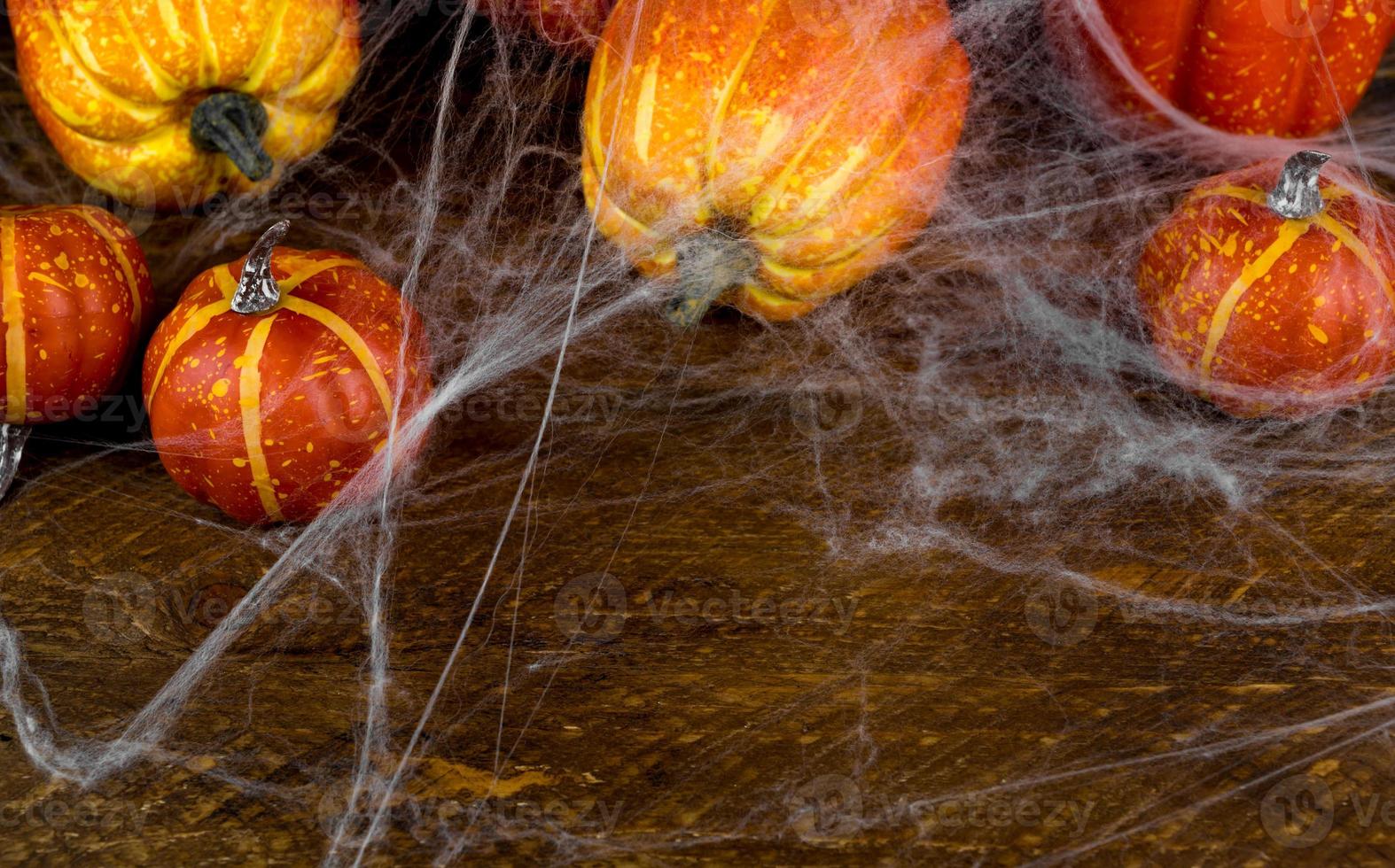 Mystery halloween banner with pumpkins and spiderweb. October 31 concept. Copy space banner photo