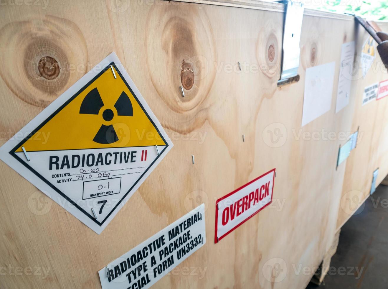 Radiation label beside the transport wooden box Type A package photo