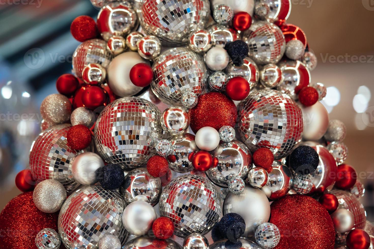 Christmas tree made of bauble decoration. New year concept. photo