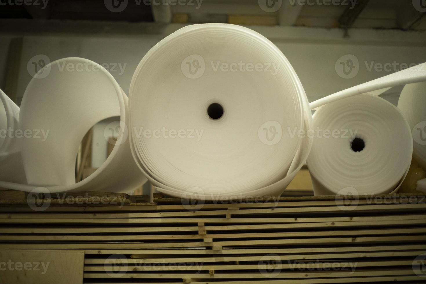 Boards and thin parallon. Parallon roll in stock. White material. photo