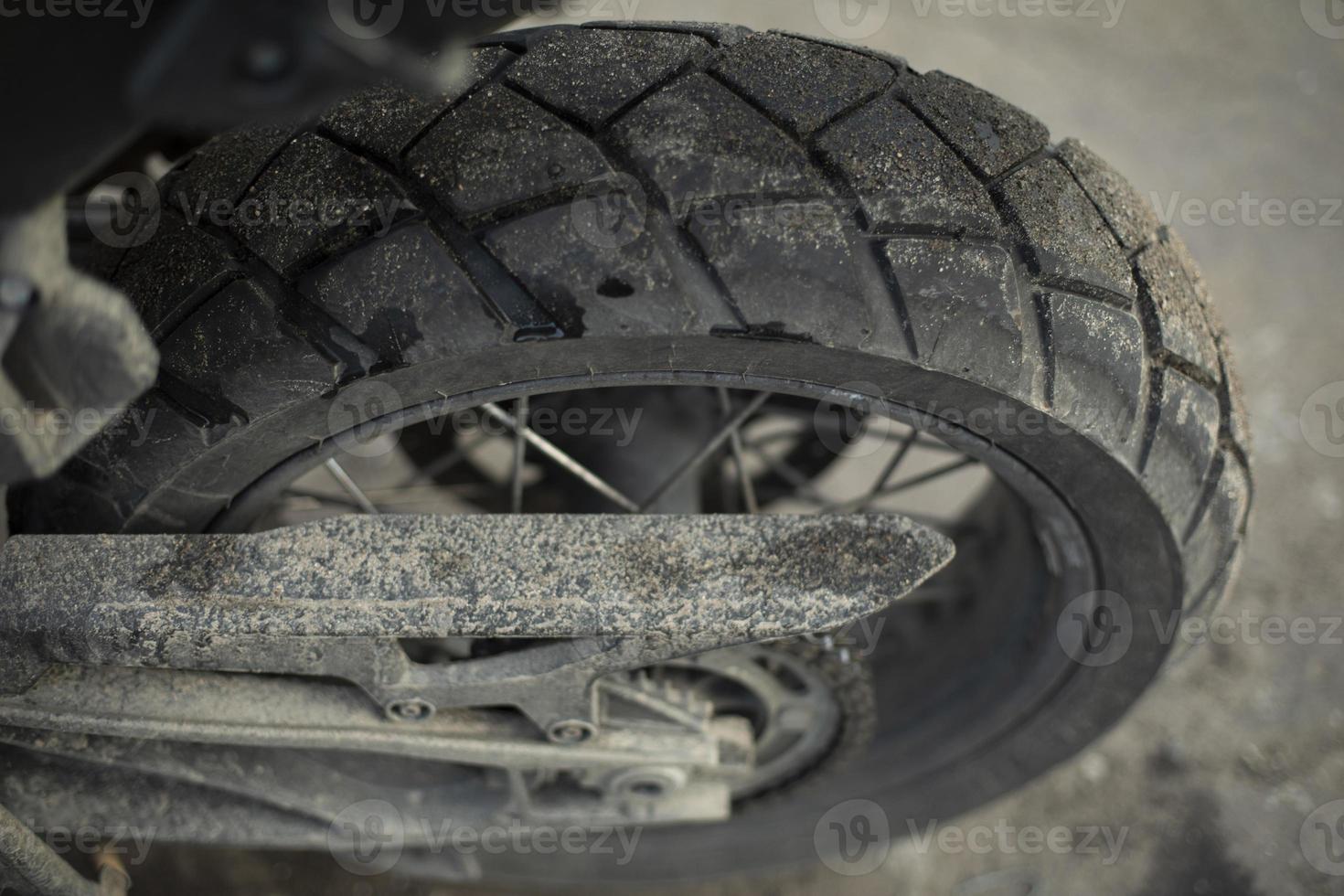 Bicycle wheel. Vehicle wheel parts. Bike in parking lot. photo