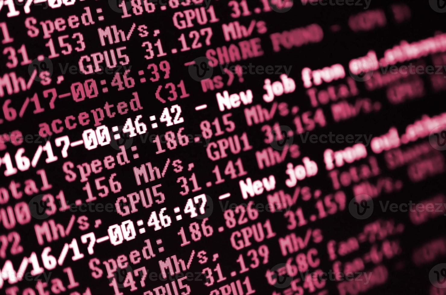 Macro snapshot of the program interface for crypto currency mining on the monitor of an office computer. Image toned in Viva Magenta, color of the 2023 year photo