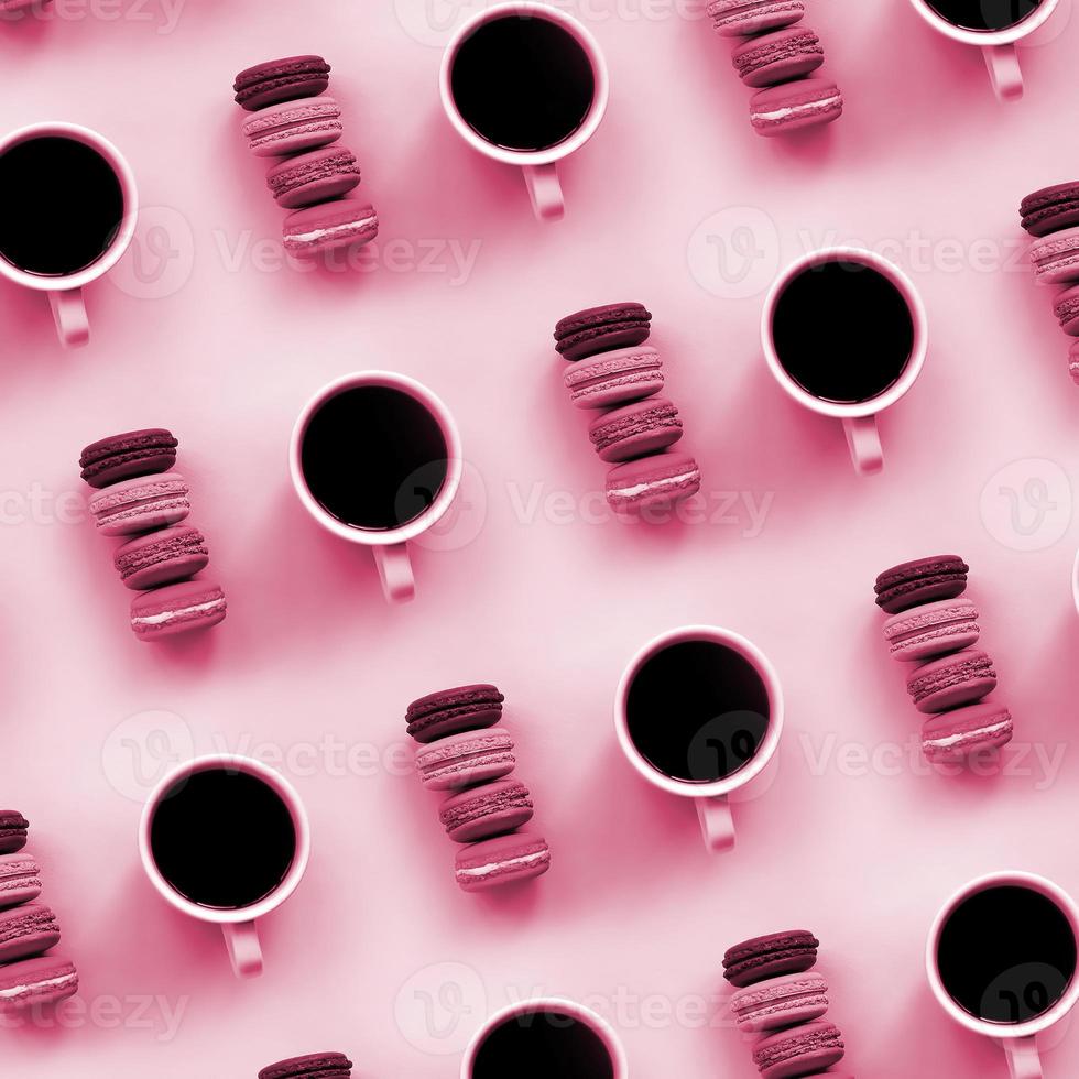 A pattern of many ful dessert cake macaroon and coffee cups on trendy background top view. Flat lay composition Image toned in Viva Magenta, color of the 2023 year photo