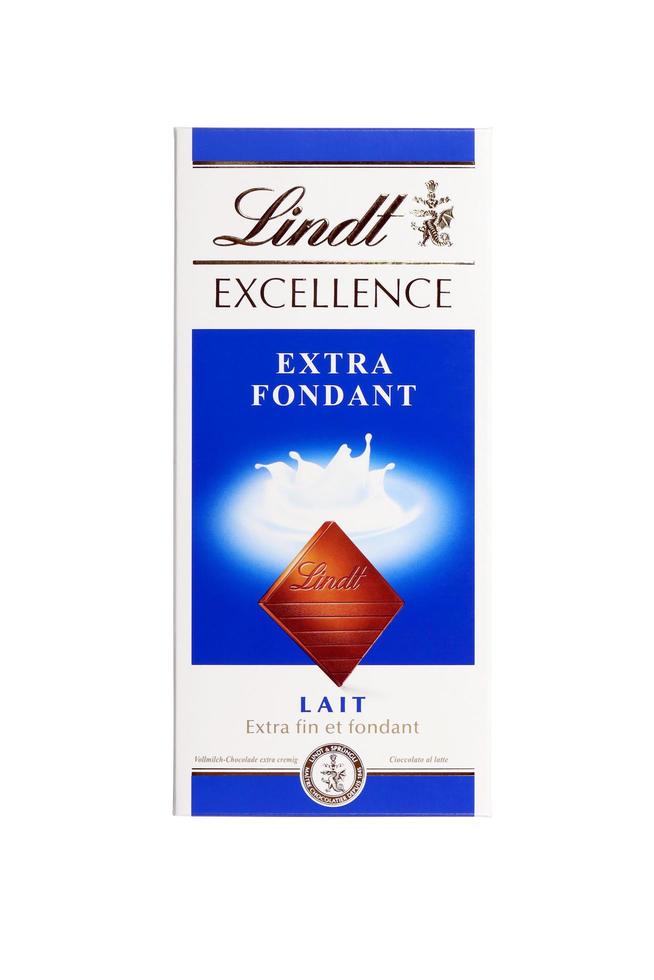 KHARKIV, UKRAINE - DECEMBER 18, 2022 Lindt Chocolate on white background. Lindt and Spruengli AG is a Swiss chocolatier and confectionery company known for their chocolate bars photo