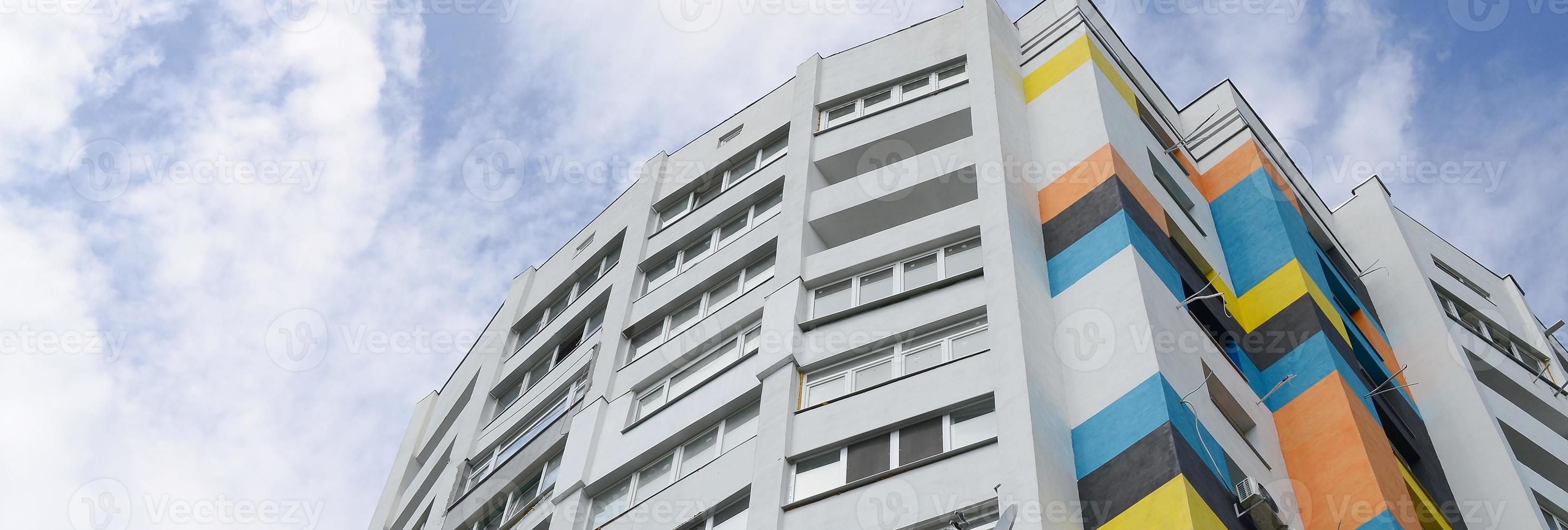 New multy storey residential building and blue sky photo