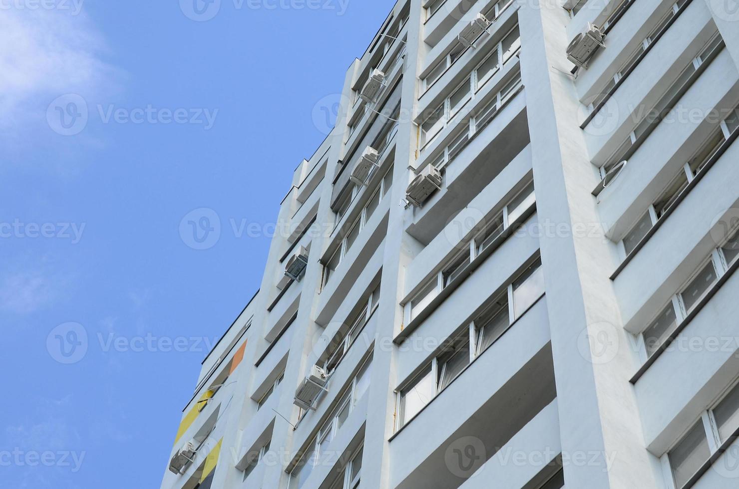 New multy storey residential building and blue sky photo