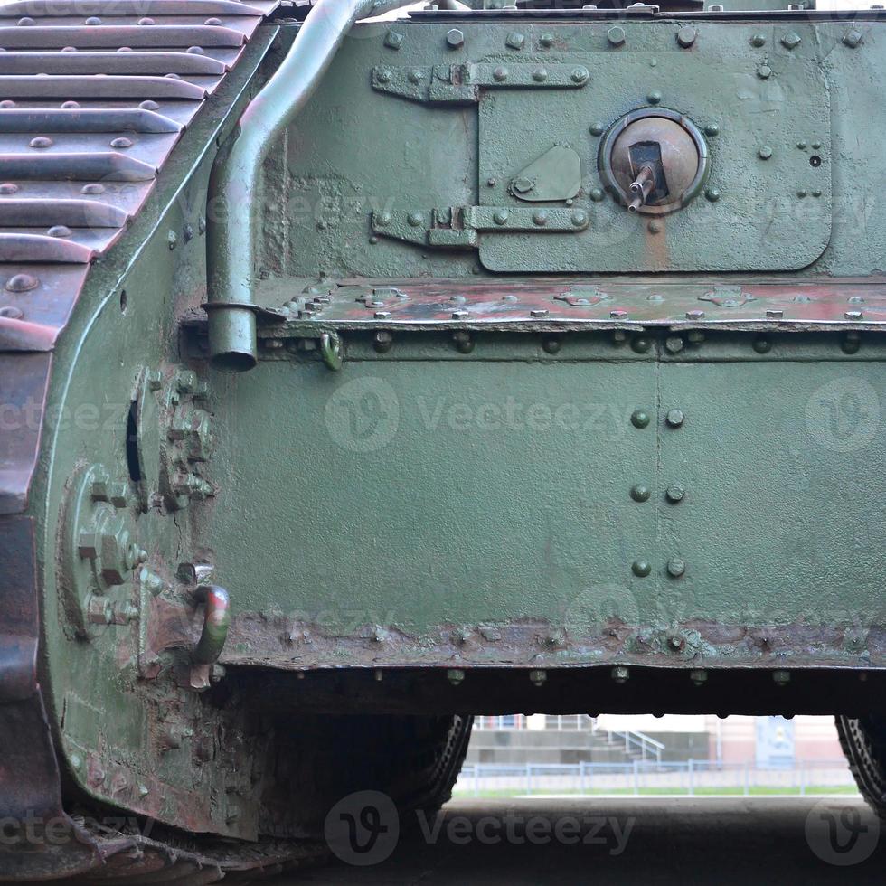 Abstract green industrial metal textured background with rivets and bolts photo