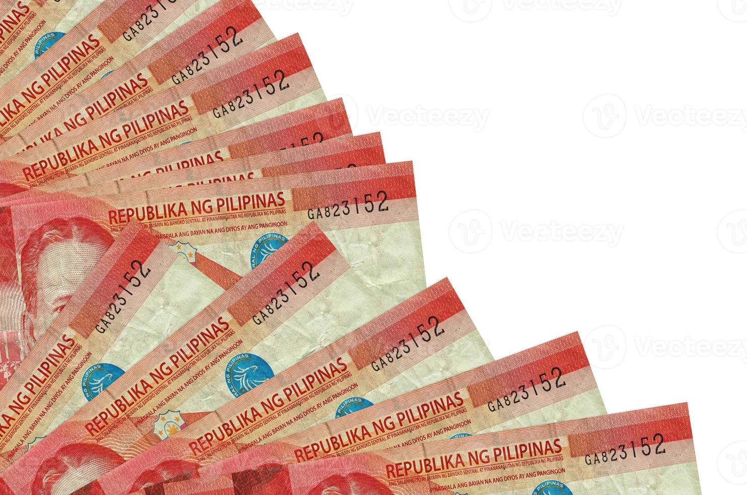 50 Philippine piso bills lies isolated on white background with copy space stacked in fan close up photo