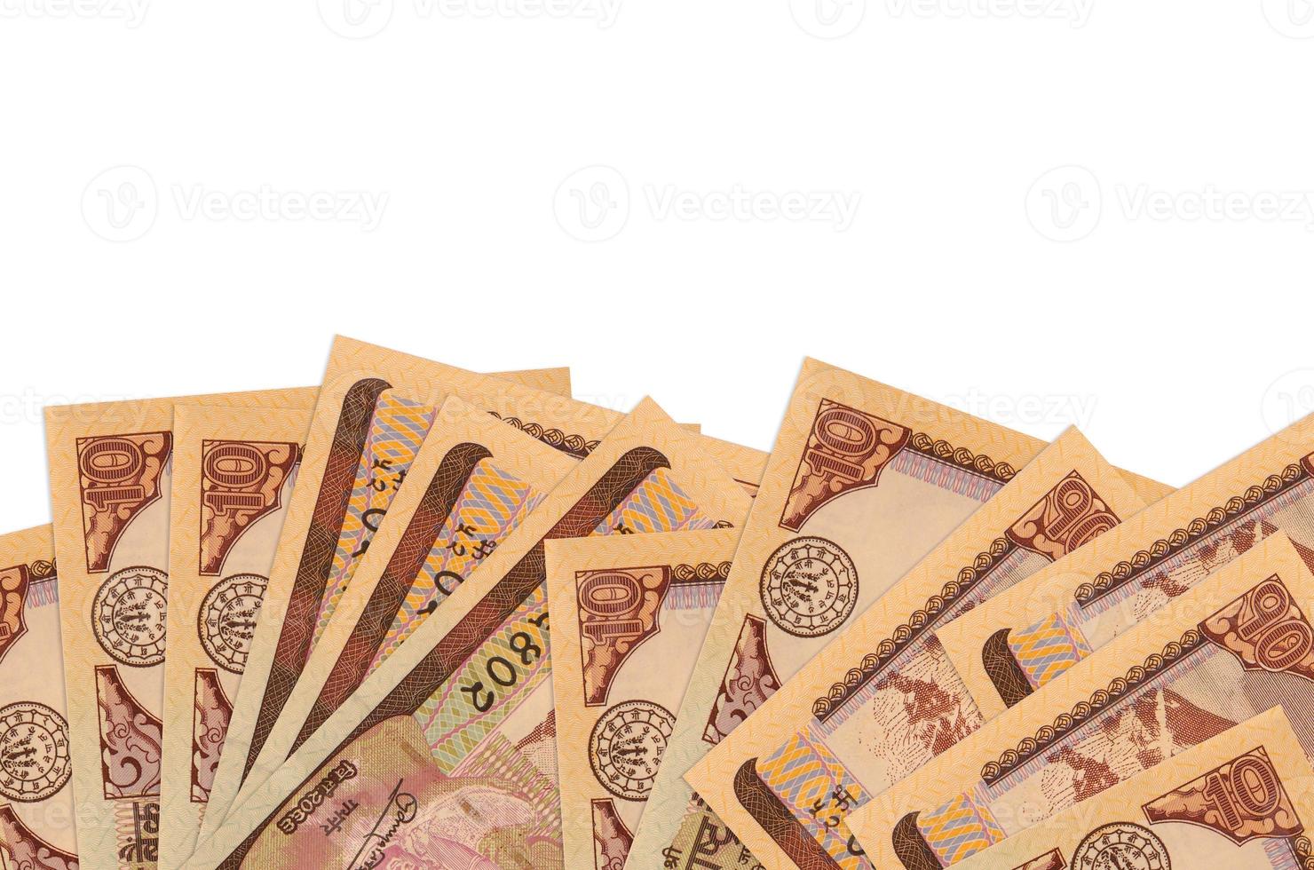 10 Nepalese rupees bills lies on bottom side of screen isolated on white background with copy space. Background banner template photo