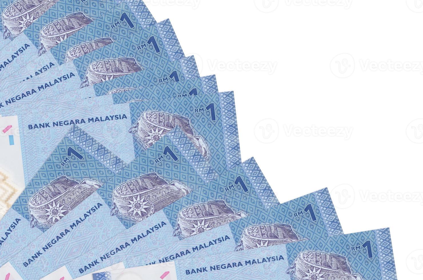 1 Malaysian ringgit bills lies isolated on white background with copy space stacked in fan close up photo