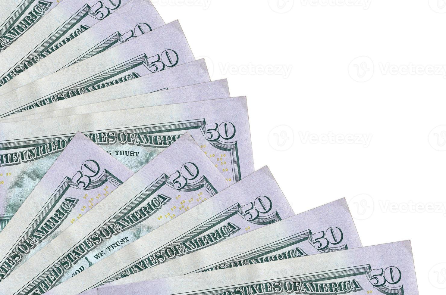 50 US dollars bills lies isolated on white background with copy space stacked in fan close up photo