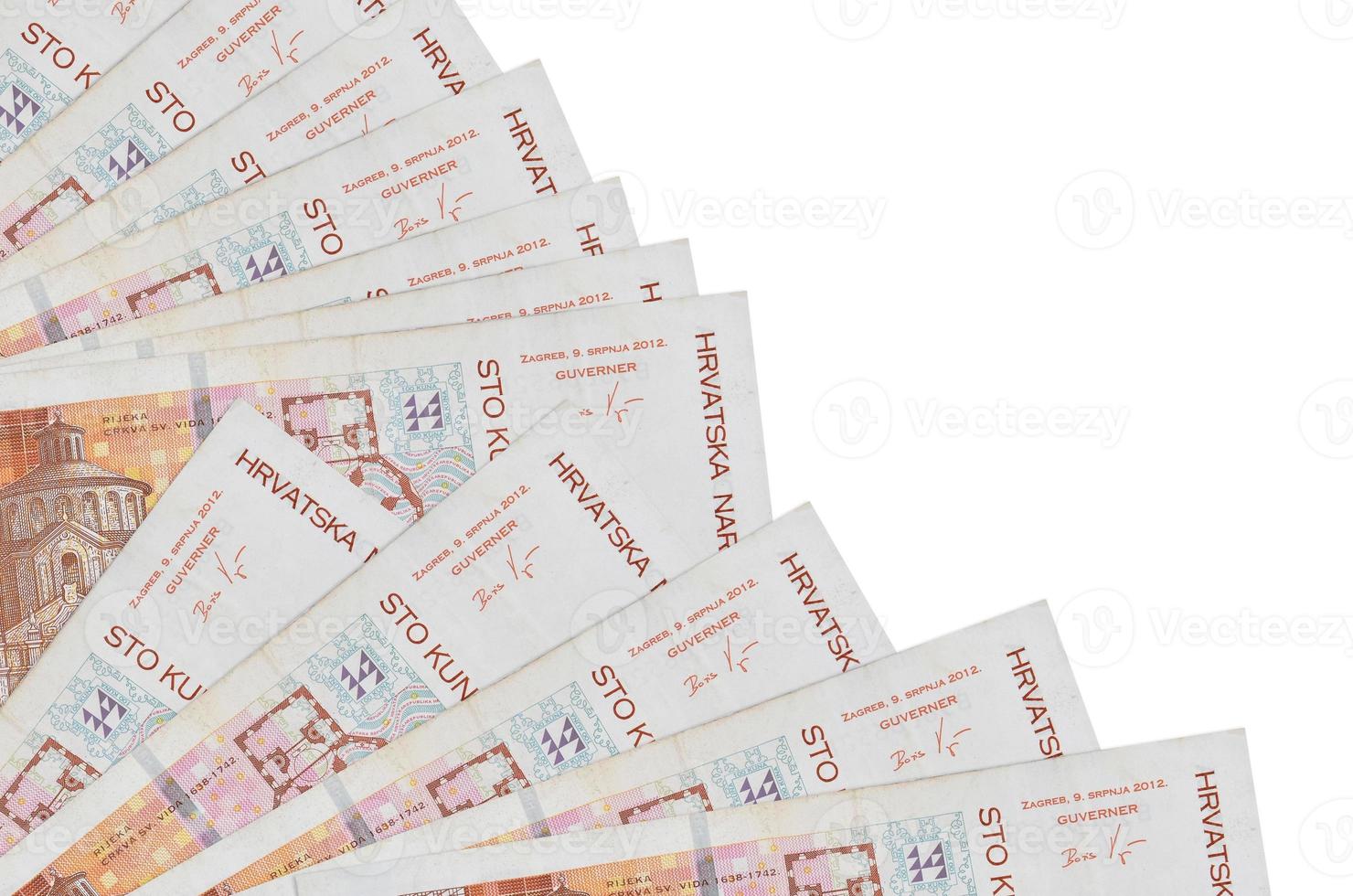 100 Croatian kuna bills lies isolated on white background with copy space stacked in fan close up photo