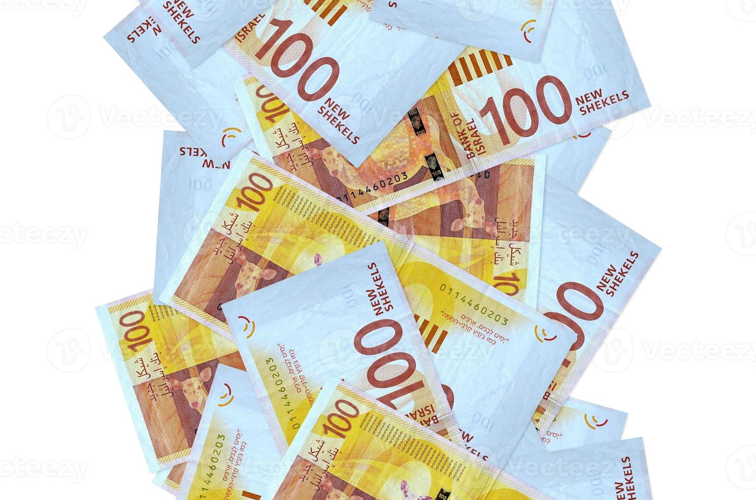 100 Israeli new shekels bills flying down isolated on white. Many banknotes falling with white copyspace on left and right side photo