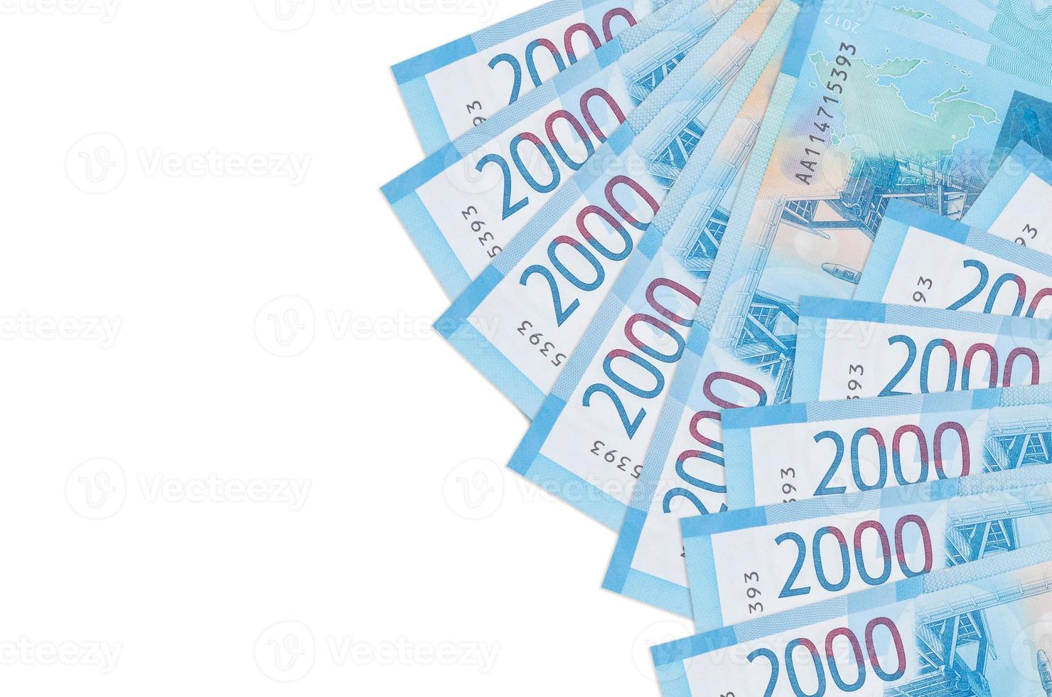 2000 russian rubles bills lies isolated on white background with copy space. Rich life conceptual background photo