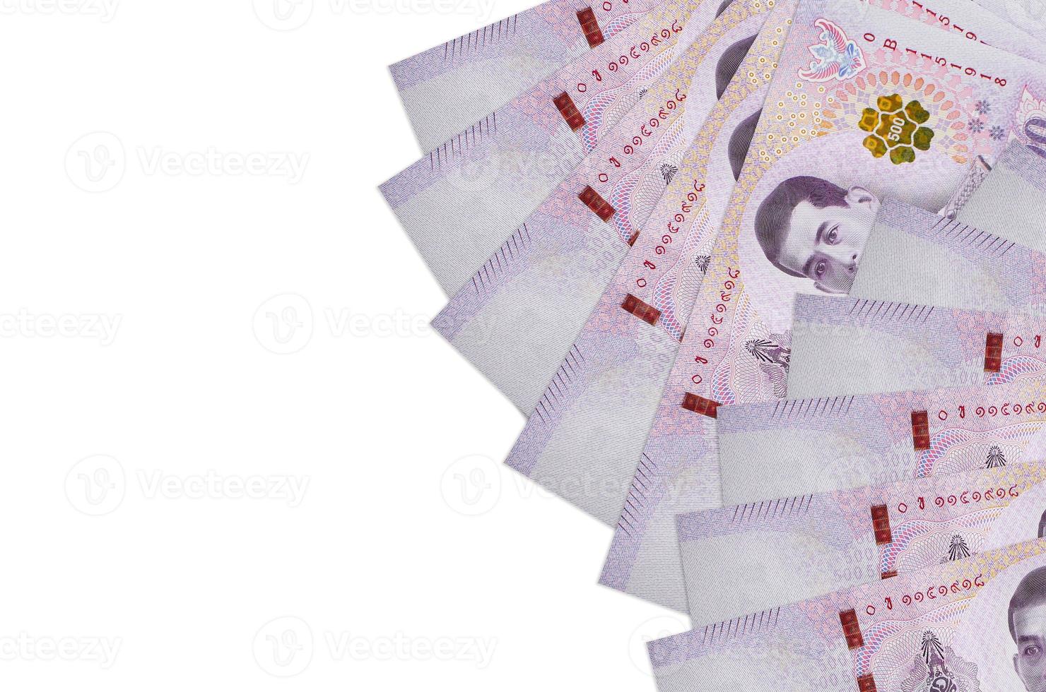 500 Thai baht bills lies isolated on white background with copy space. Rich life conceptual background photo