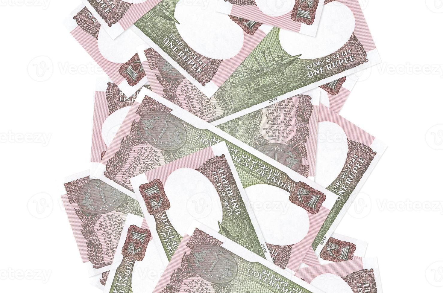 1 Indian rupee bills flying down isolated on white. Many banknotes falling with white copyspace on left and right side photo
