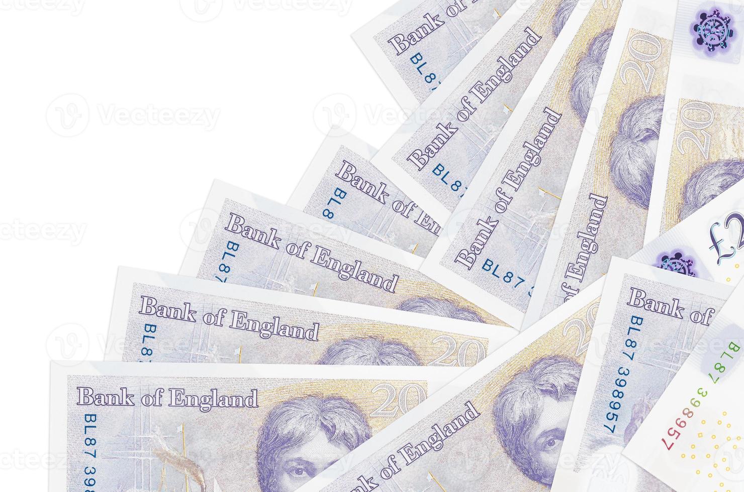 20 British pounds bills lies in different order isolated on white. Local banking or money making concept photo