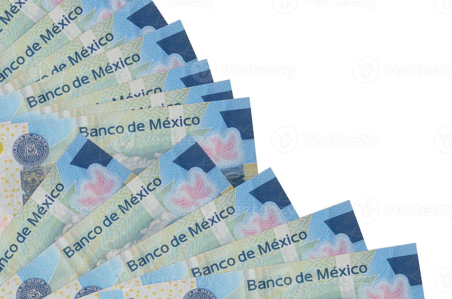 20 Mexican pesos bills lies isolated on white background with copy space stacked in fan close up photo