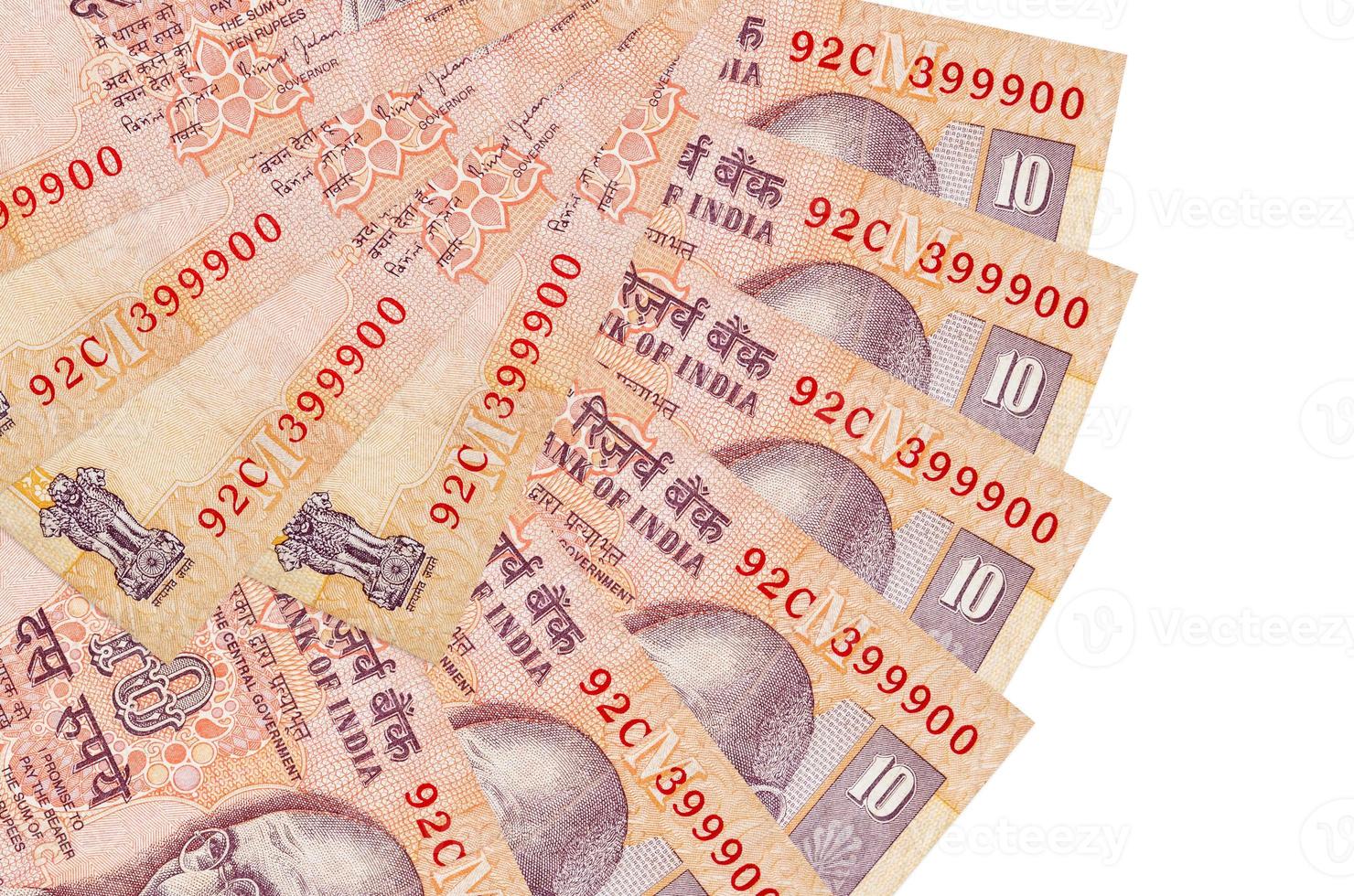 10 Indian rupees bills lies isolated on white background with copy space stacked in fan shape close up photo