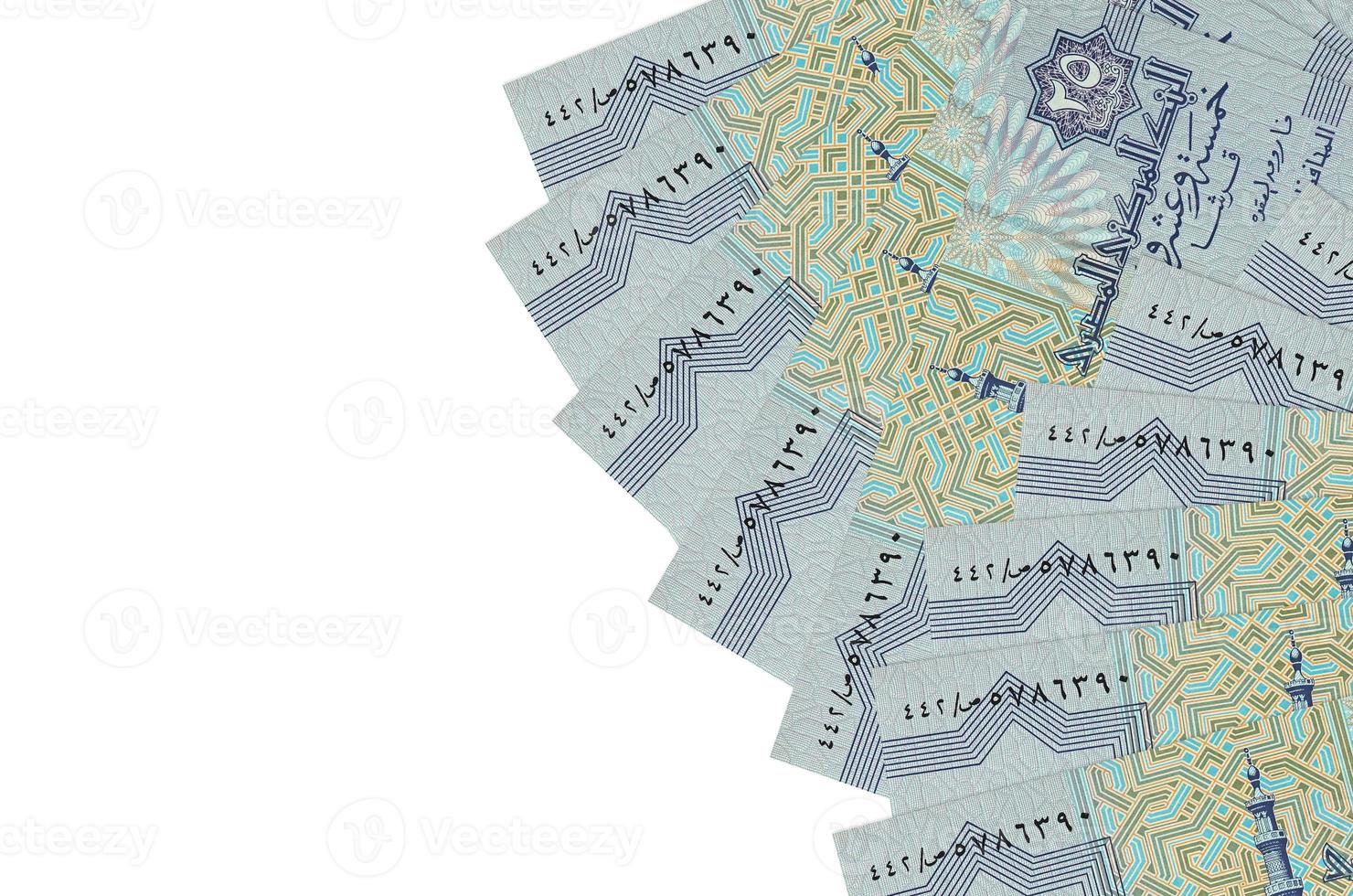25 Egyptian piastres bills lies isolated on white background with copy space. Rich life conceptual background photo