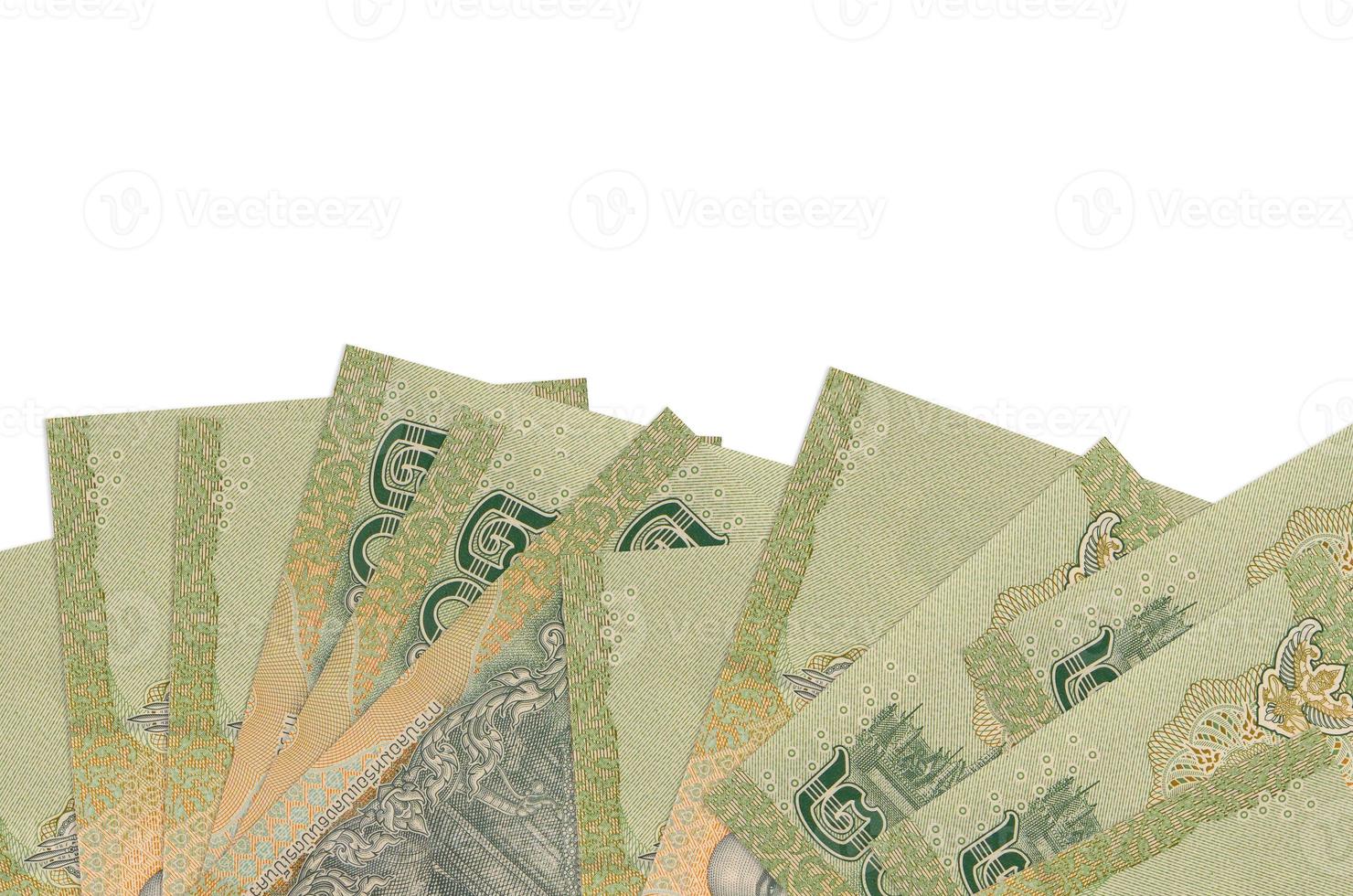 20 Thai Baht bills lies on bottom side of screen isolated on white background with copy space. Background banner template photo