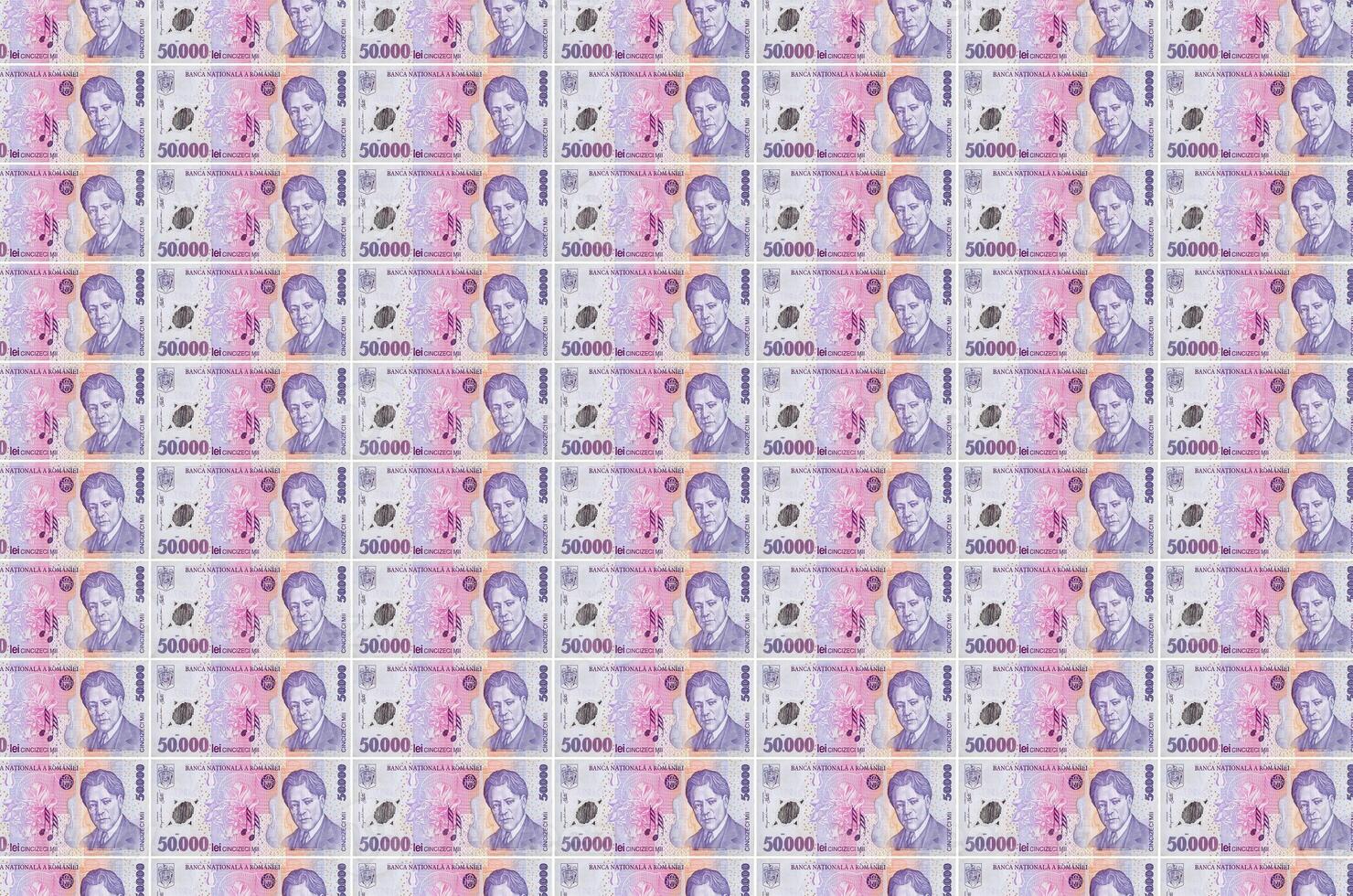 50000 Romanian leu bills printed in money production conveyor. Collage of many bills. Concept of currency devaluation photo