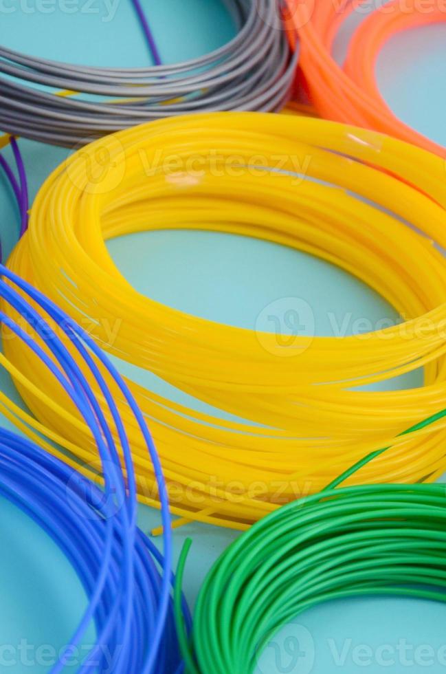 Plastic PLA and ABS filament material for printing on a 3D pen or printer of various colors photo