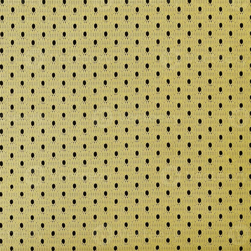 Yellow mesh sport wear fabric textile background pattern photo