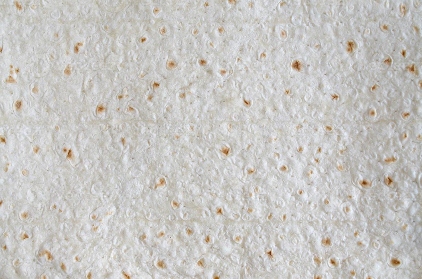 Homemade flat pita bread Turkish lavash background texture top view