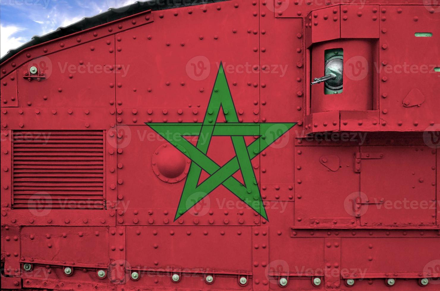 Morocco flag depicted on side part of military armored tank closeup. Army forces conceptual background photo