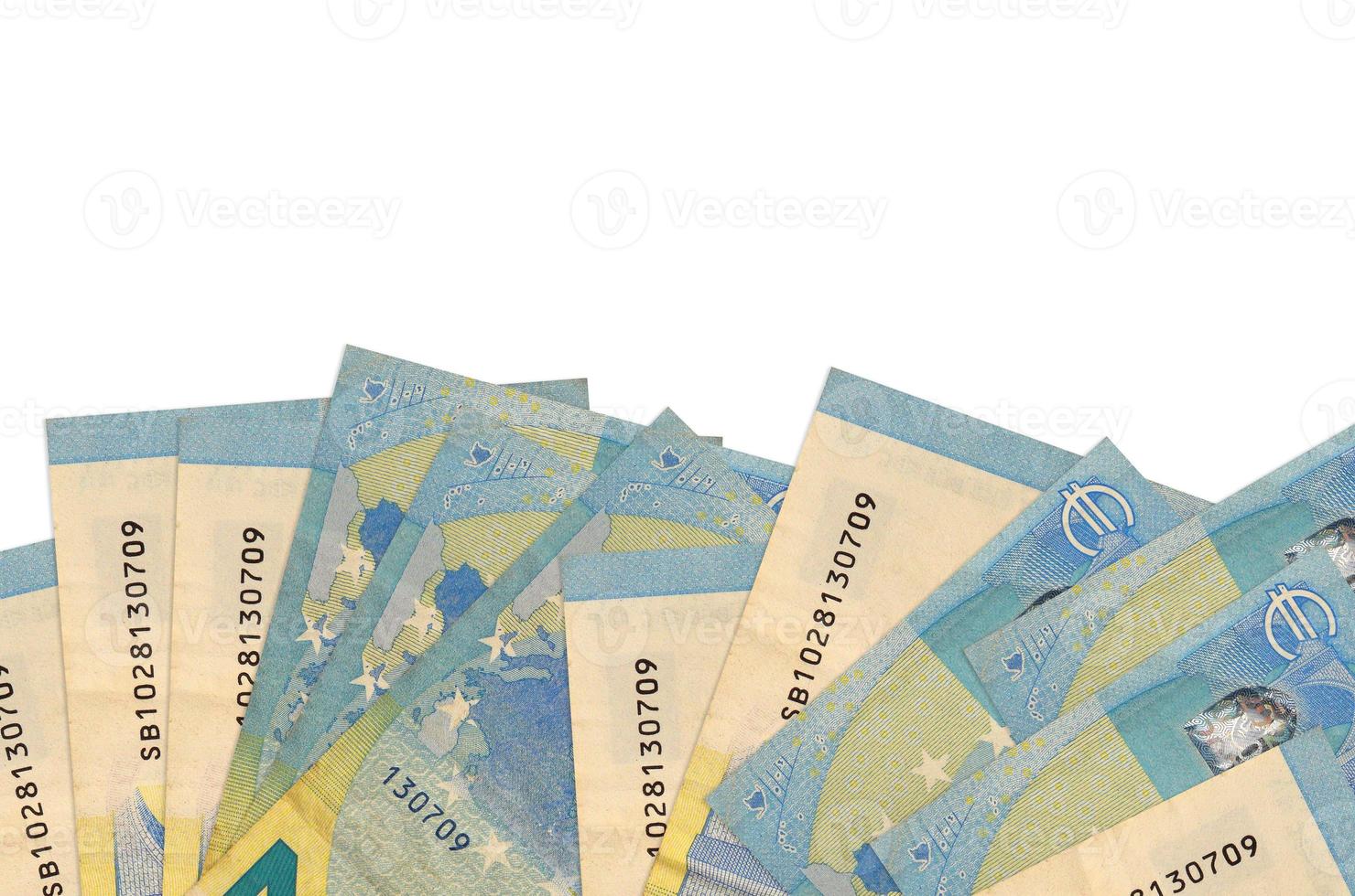 20 euro bills lies on bottom side of screen isolated on white background with copy space. Background banner template photo