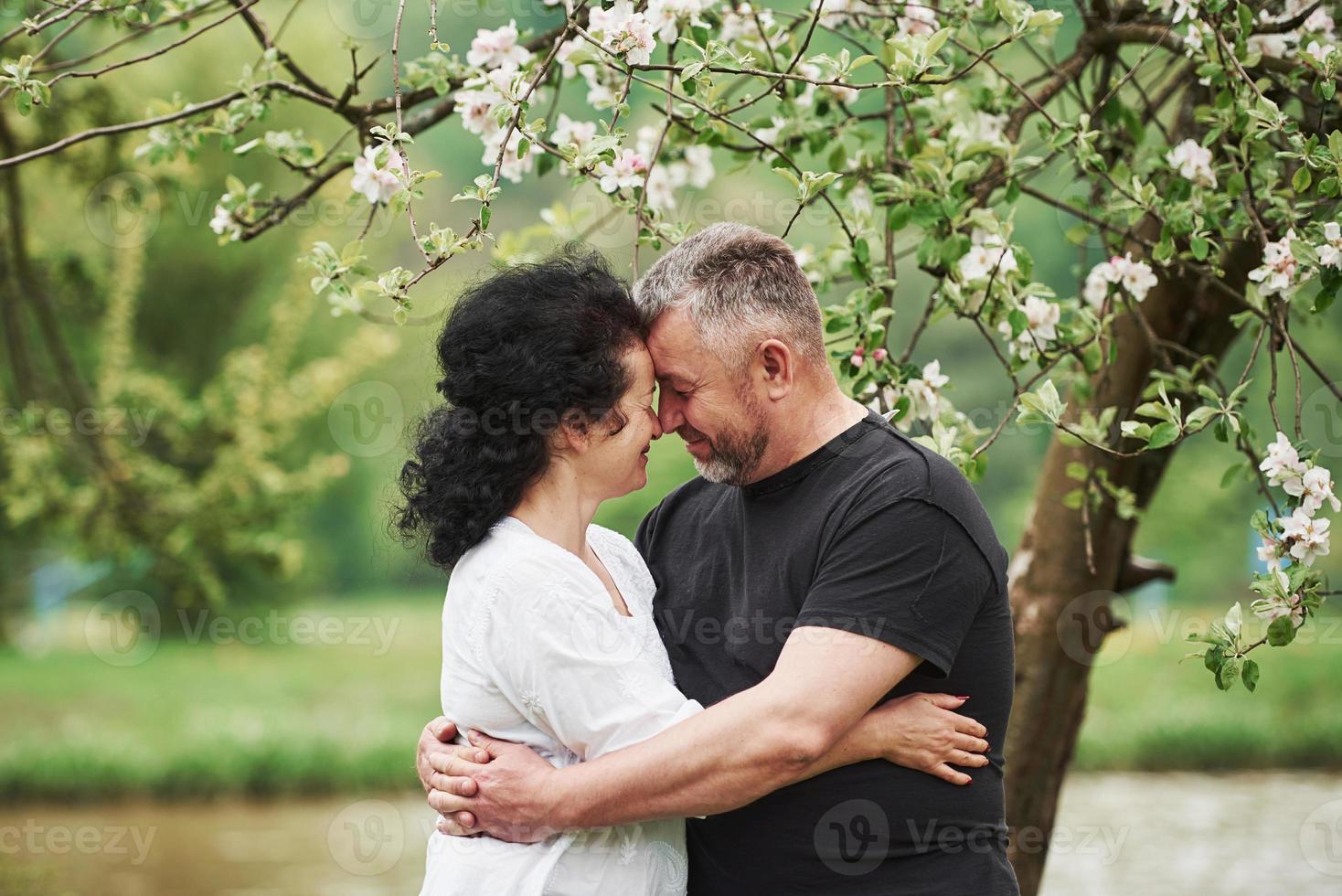Close up view. Cheerful couple enjoying nice weekend outdoors. Good spring weather photo