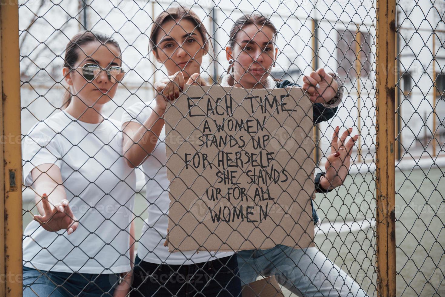 Front view. Group of feminist women have protest for their rights outdoors photo