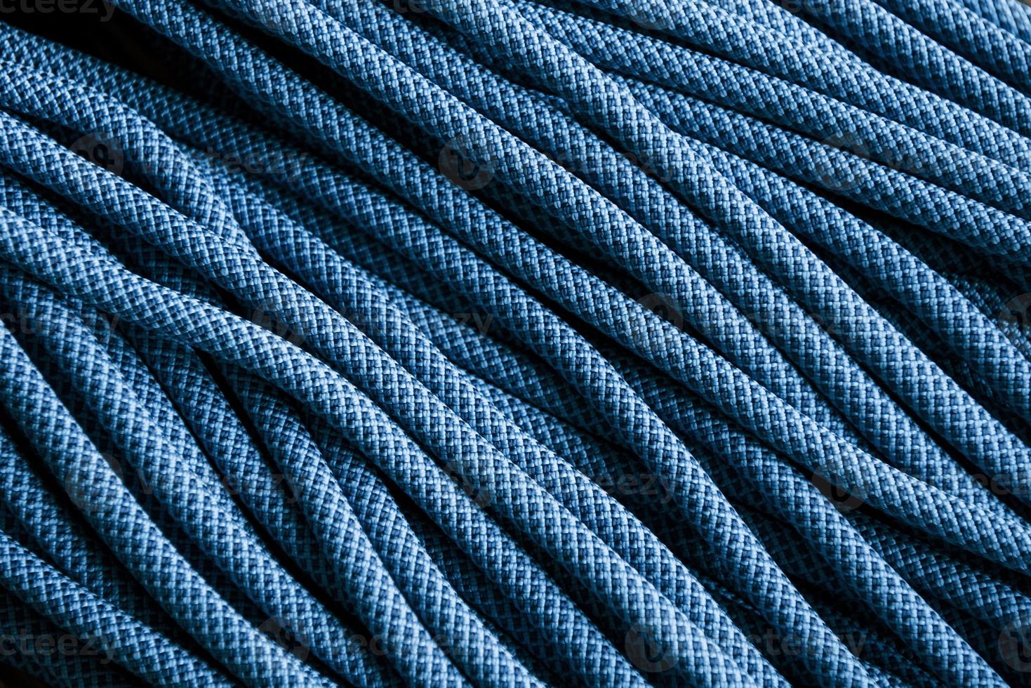 Textured background. Many of the blue colored knots for the sports and ship equipment lying down on the floor photo