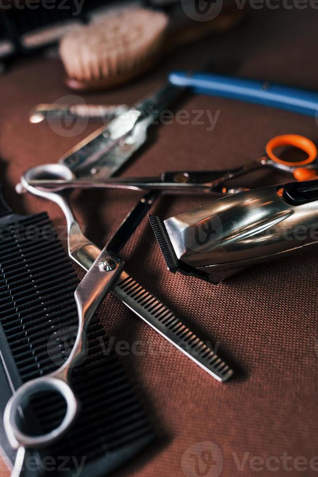 Close up view of vintage barber shop tools that lying down on the table photo