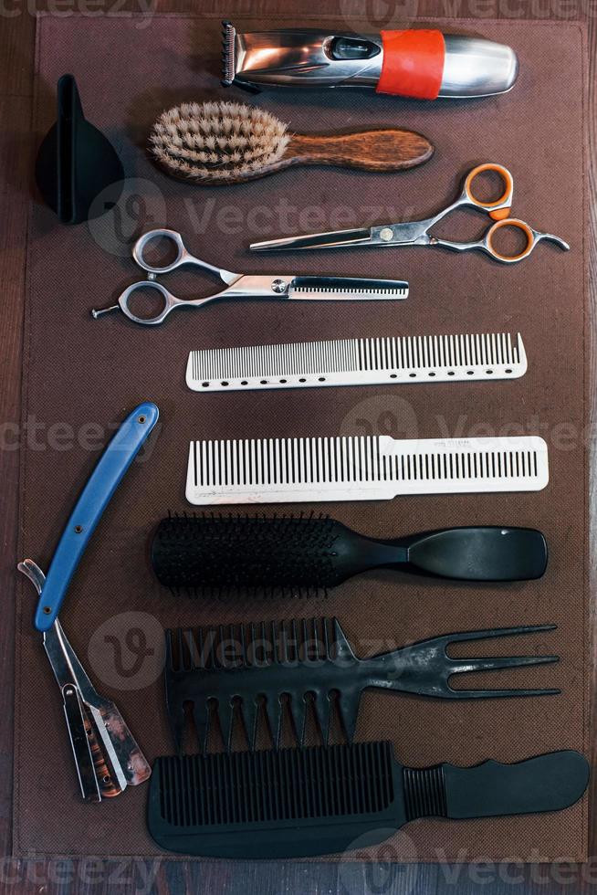 Close up view of vintage barber shop tools that lying down on the table photo
