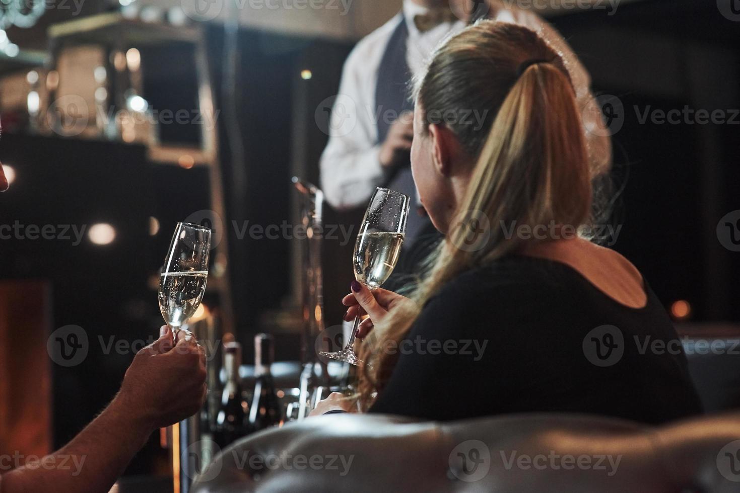 Girl with her boyfriend have nice evening at beautiful restaurant photo