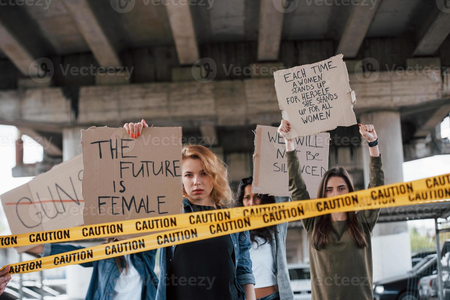 We won't give in. Group of feminist women have protest for their rights outdoors photo