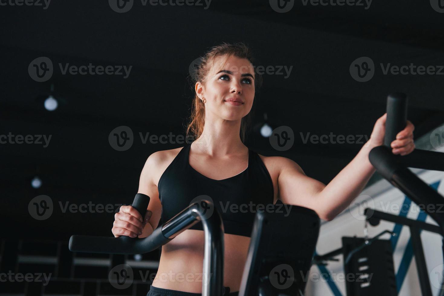 Pretty woman. Photo of gorgeous blonde girl in the gym at her weekend time
