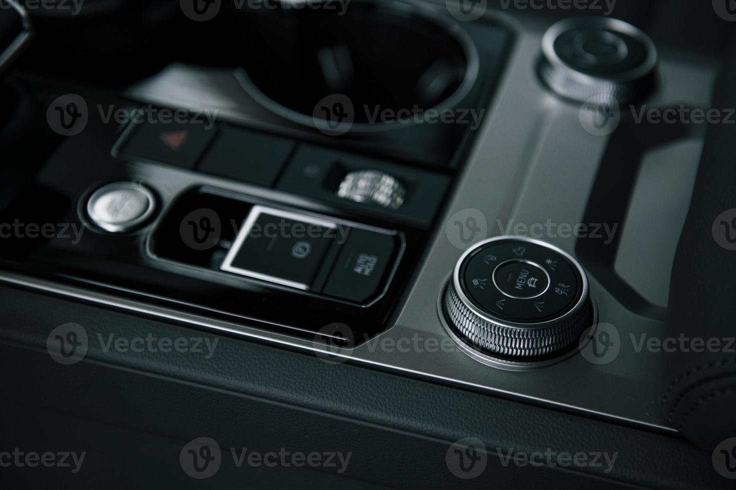 Different options. Close up view of interior of brand new modern luxury automobile photo