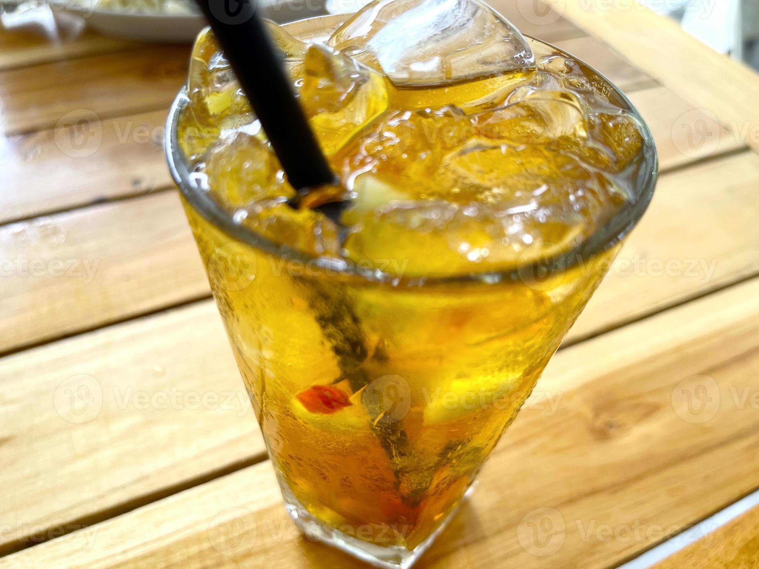 fresh mix fruit cocktail alcohol drink with rum and whiskey in a clear