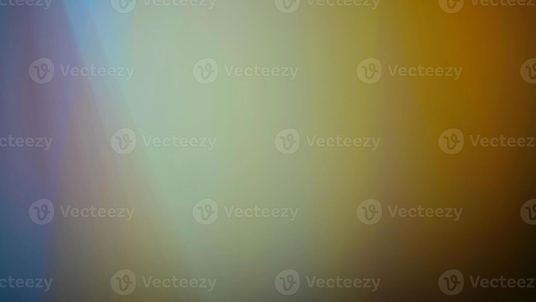 Smooth and blurry colorful gradient mesh background. Purple, yellow, green and black. photo